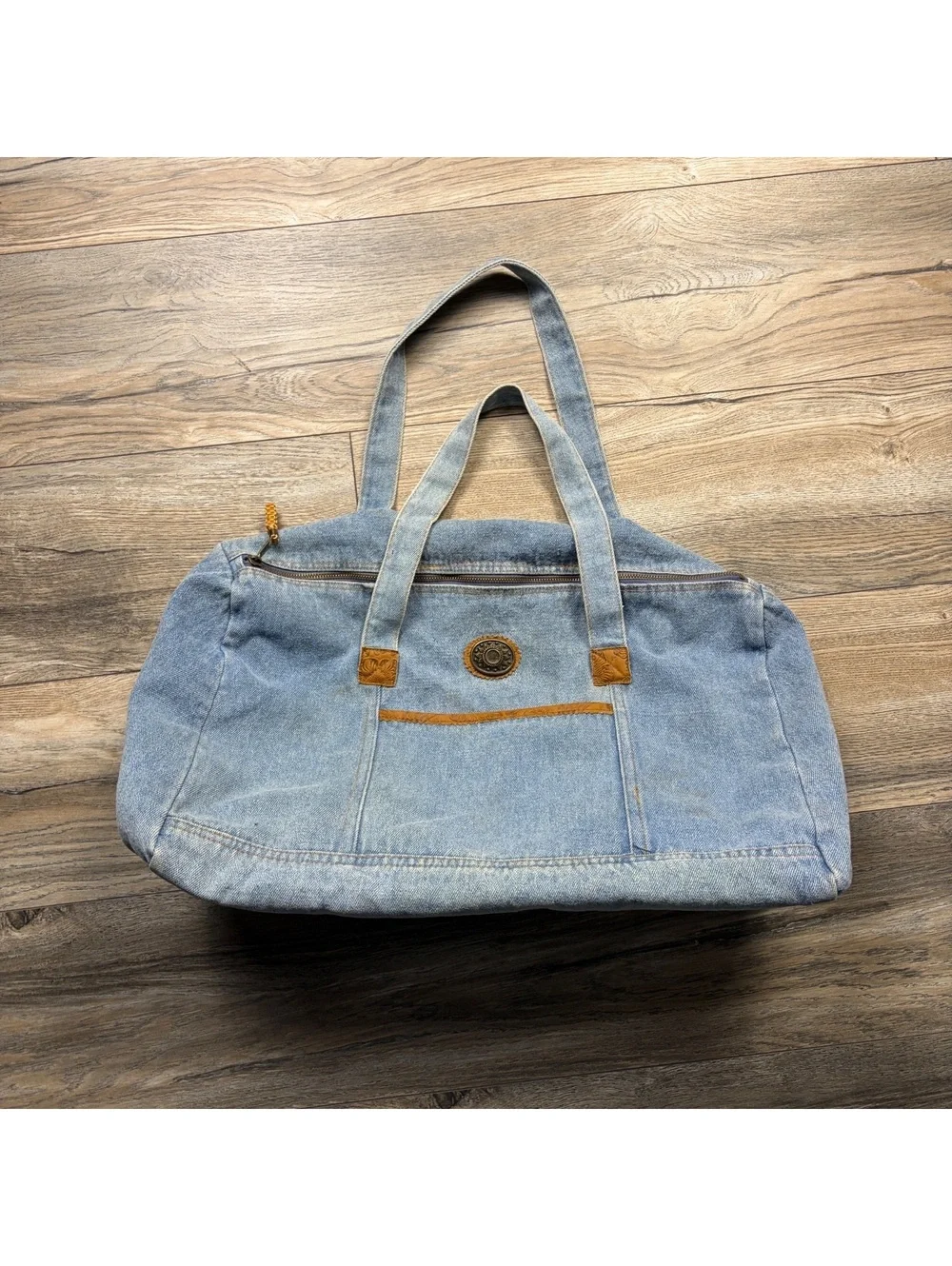 Vintage denim duffel bag, stains throughout but no distressing
